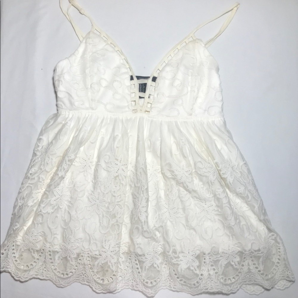 White flowy top